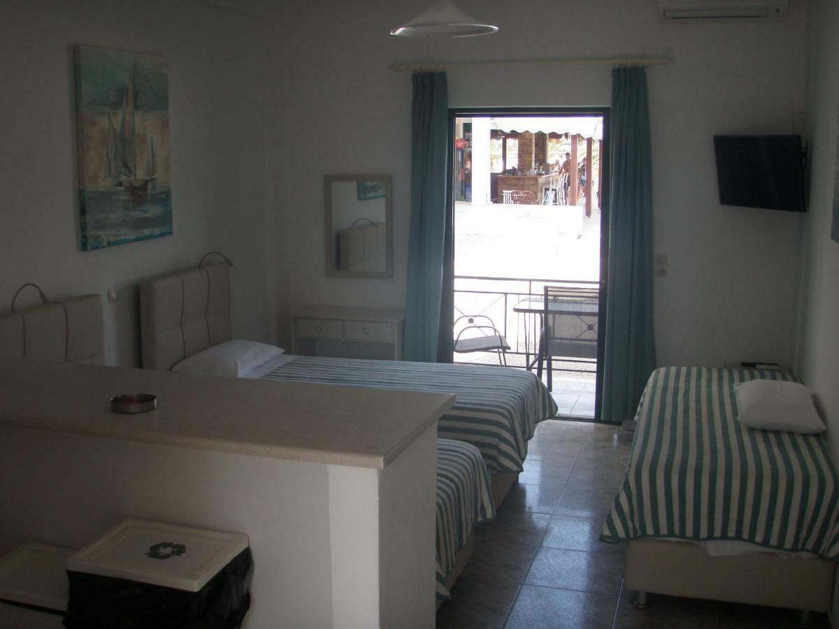 Umbrella Beach Apartments Kavos Exterior photo